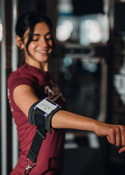  a fitness tracker on her wrist